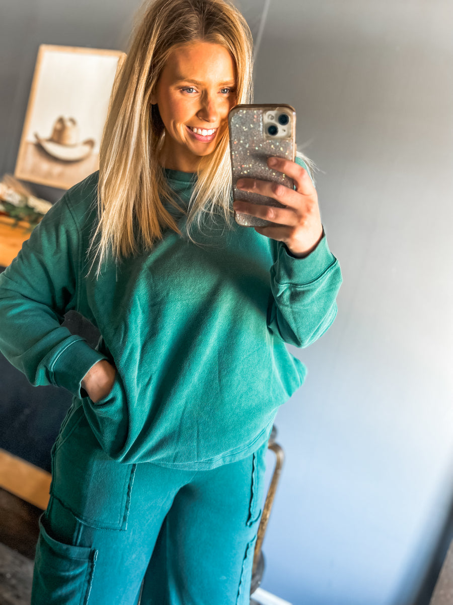 Dark green oversized sweater with pockets