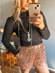 Rose gold sequin shorts