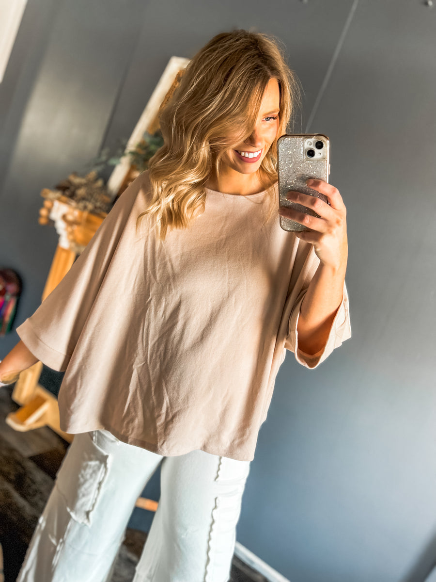 Blush oversized dolman sleeved top