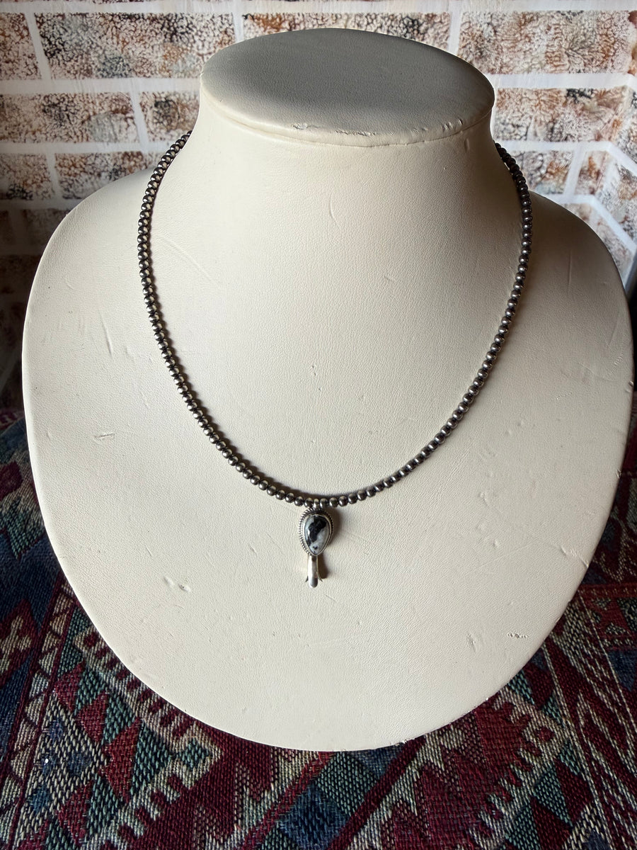 T23 18in. 3mm pearl with attached White Buffalo Blossom