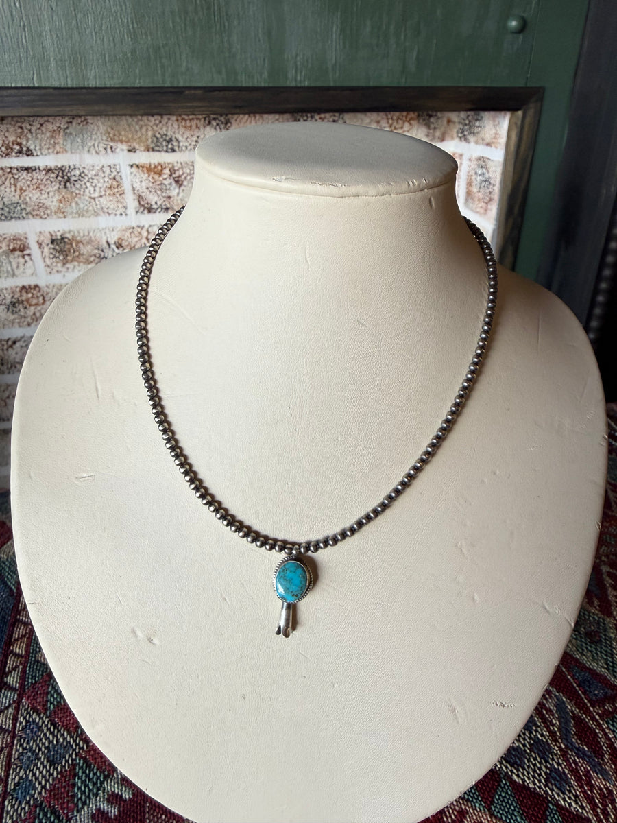 T31 18in. 3mm pearl with attached Turquoise Blossom