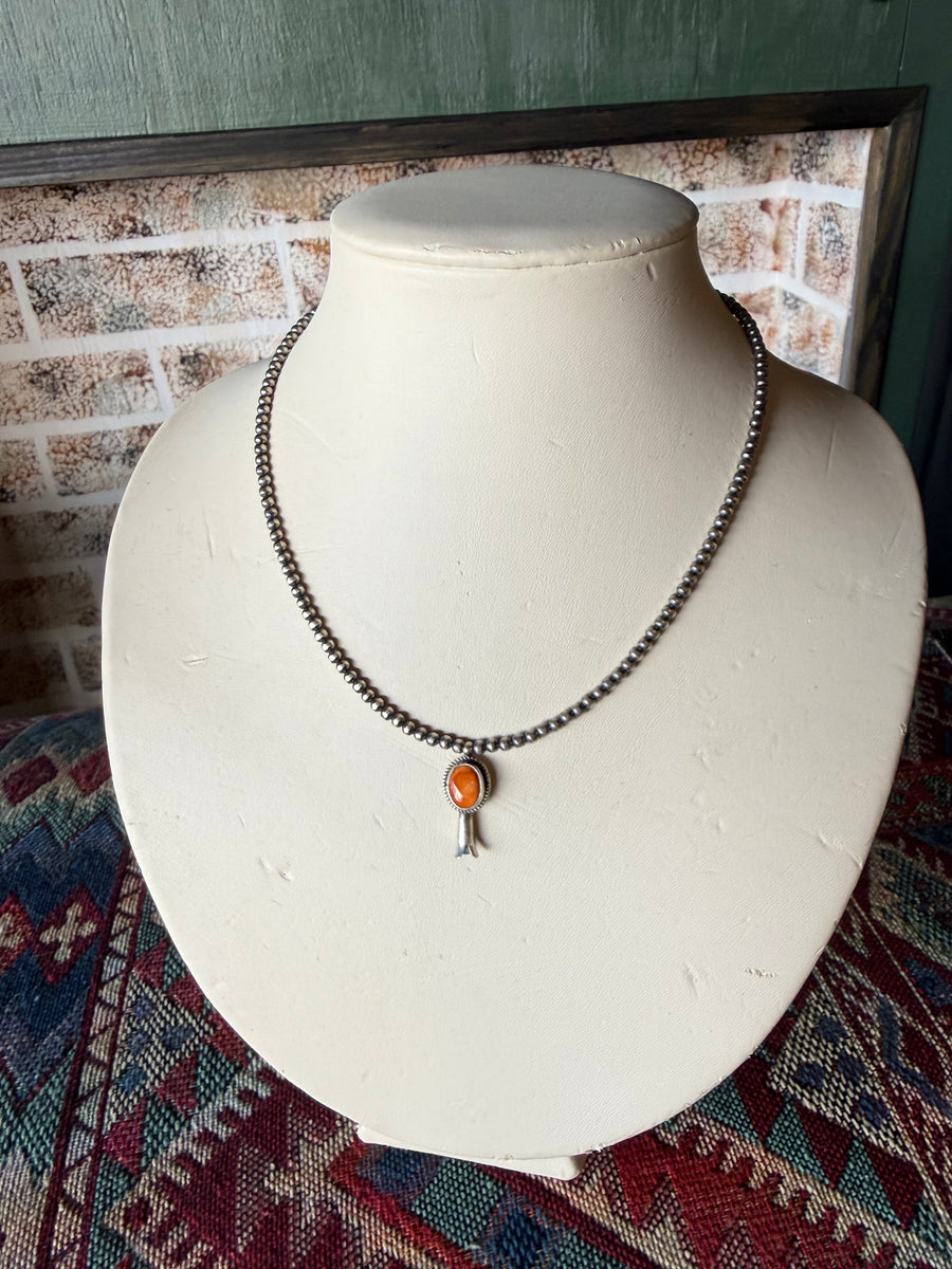 T7 18in. 3mm pearl with attached Spiny Orange Blossom