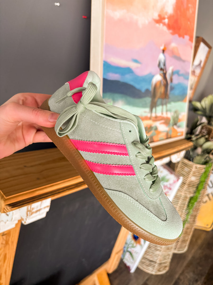 Green with pink shoe