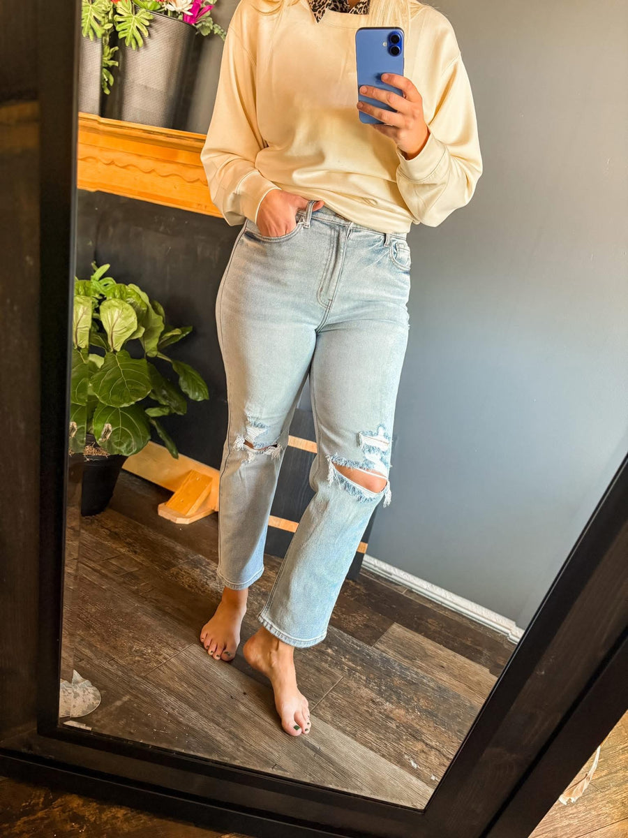 Denim jeans with holes